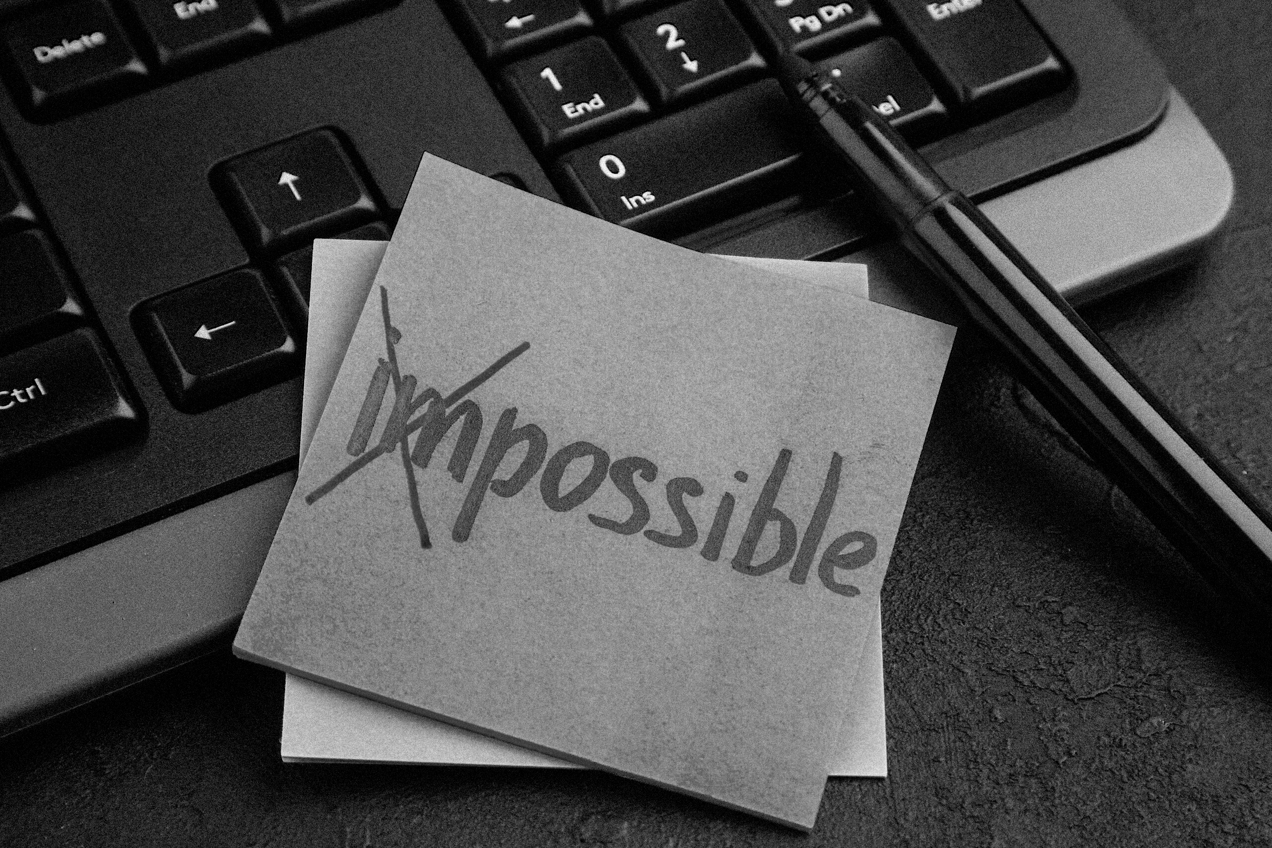 front view motivation notes with keyboard on a dark background p